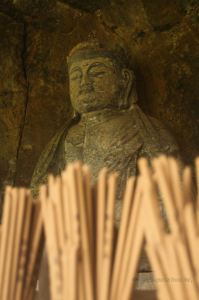 Detail of the Furuzono stone Buddhas: the Dainichi Nyorai (12th century) is considered the finest stone Buddha statue, Usuki, Japan.