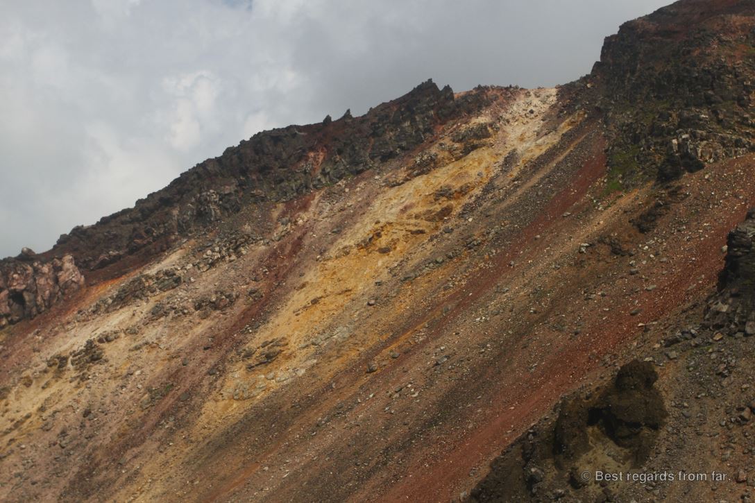 The colourful and volcanic slopes of the active Asahi-dake volcano in the Daisetsuzan National Park, Hokkaido Japan. The start of the Grand Traverse hike.