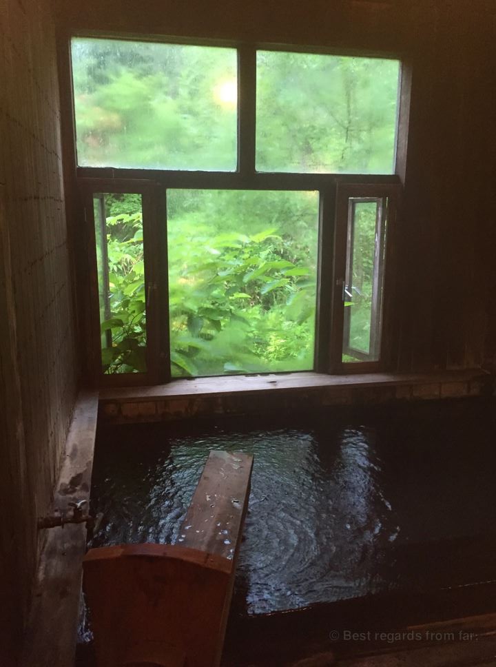The onsen overlooking the river in the ryokan, Hokkaido.