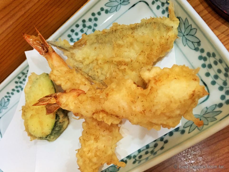 Freshly prepared tempura shrimps and vegetables in a dish, Japan.