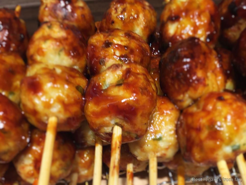 Yakitori of chicken meatballs with sweet sauce (tsukune: つくね), Japan.