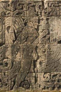Details of a bas relief showing a warrior in Chichén Itza, Mexico