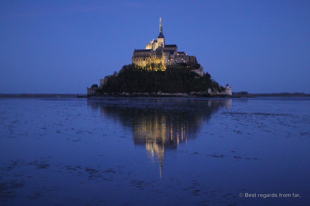 The Mont Saint Michel, reflected in the waters of its bay