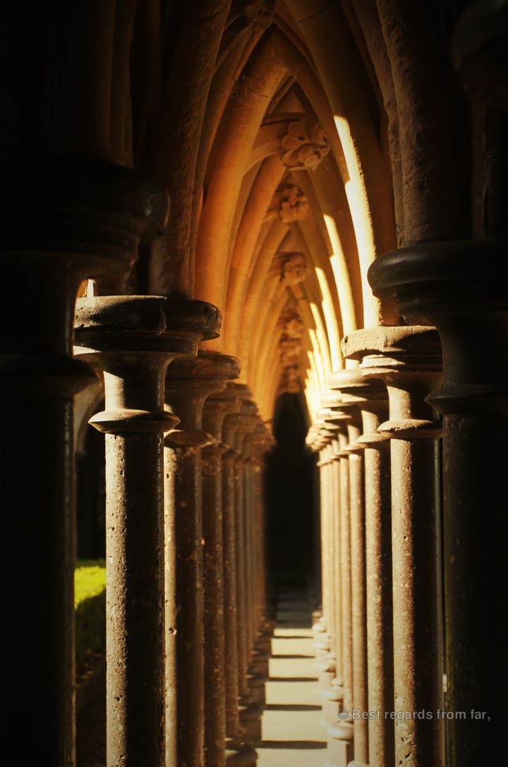 Play of light on the pillars surrounding the cloister, Mont Saint Michel