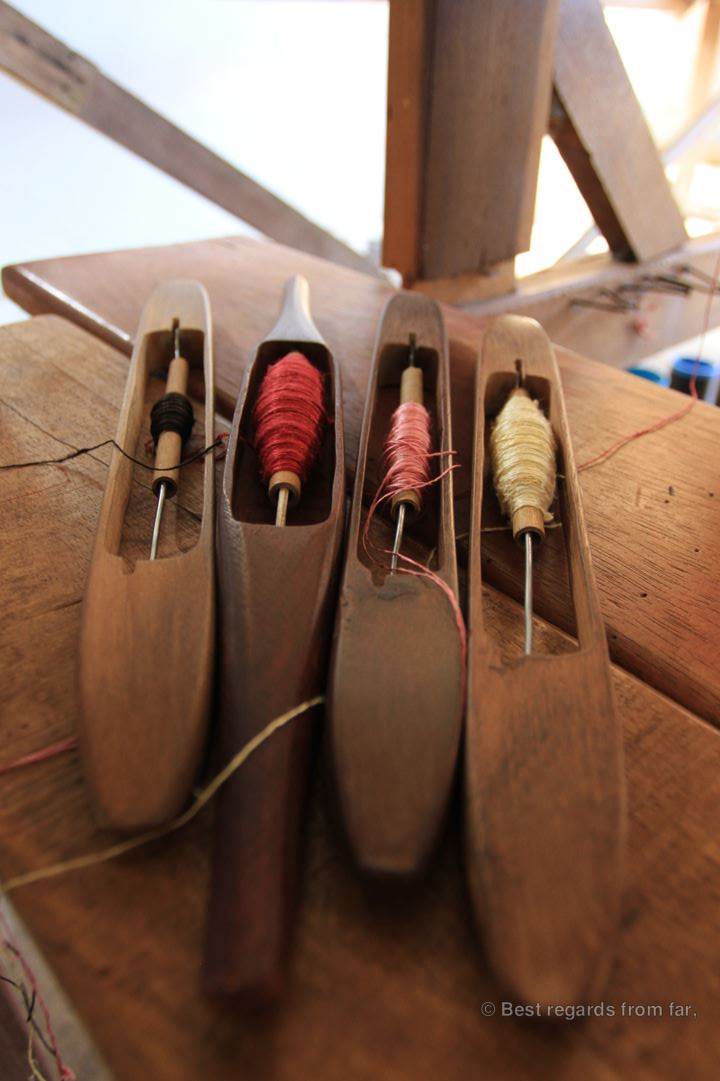 4 rolls of silk ready to be woven.