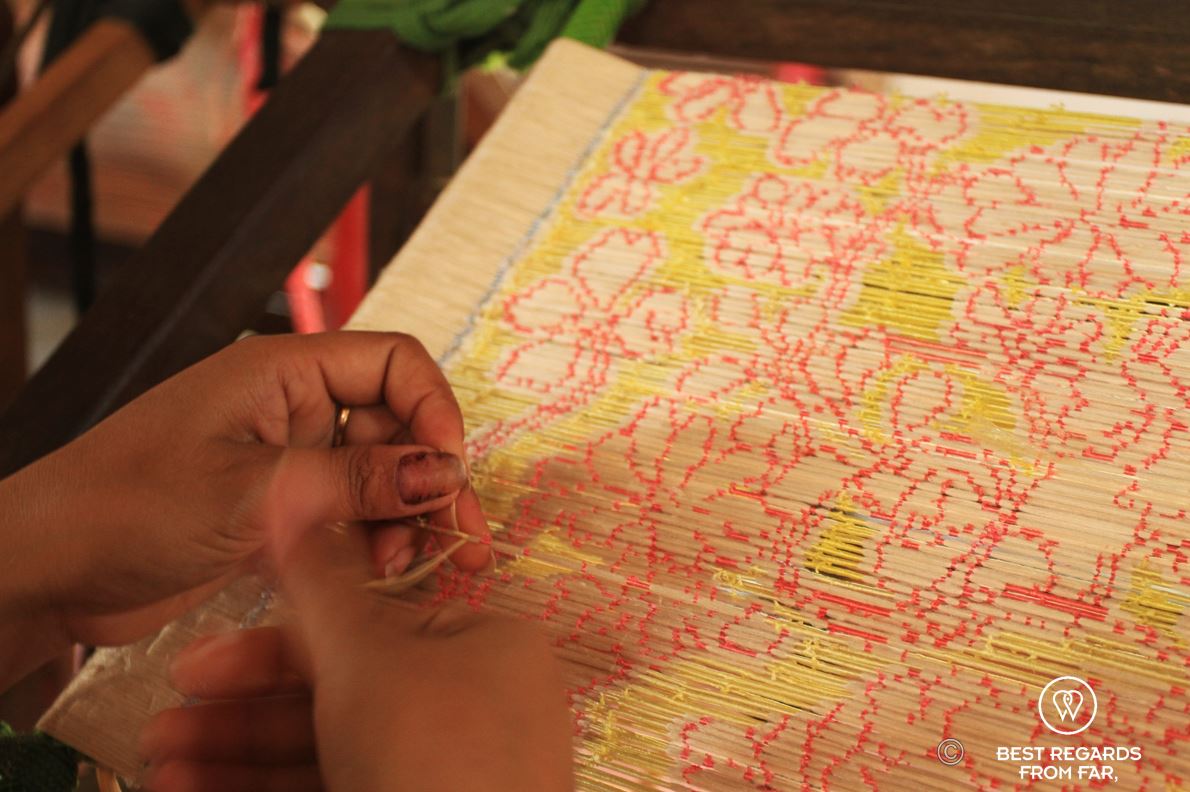 Golden silk threads being wrapped before dyed.