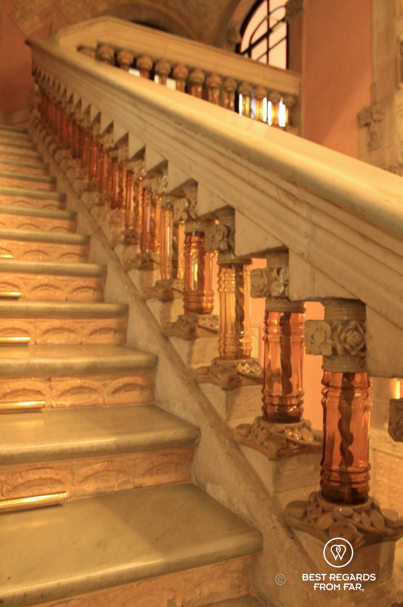The marble and glass staircase of the Palau de la Musica Catalana.