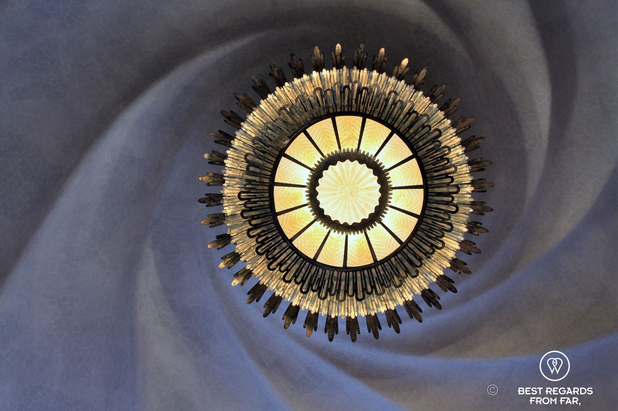Close-up of the ceiling in Casa Batllo that looks like a whirlpool.