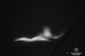 Light projected on a dark wall, Louvre Abu Dhabi, UAE