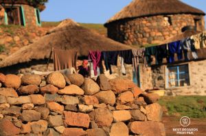 Traditional village with rondavels and drying laundry, Lesotho