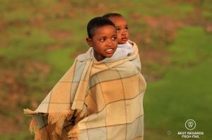 Portrait of two Basotho children in the traditional blanket, Lesotho.