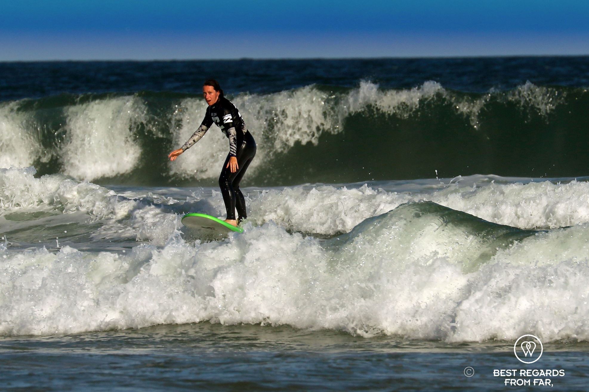 Surfing a wave on a foam board