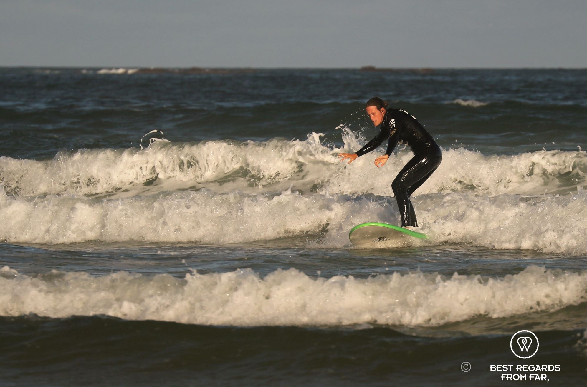Marcella riding a wave