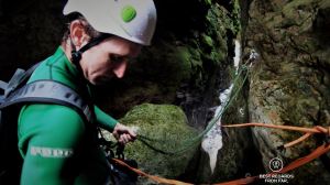 The canyoning guide Marthinus Esmeyer setting up the ropes to slide down the canyon.