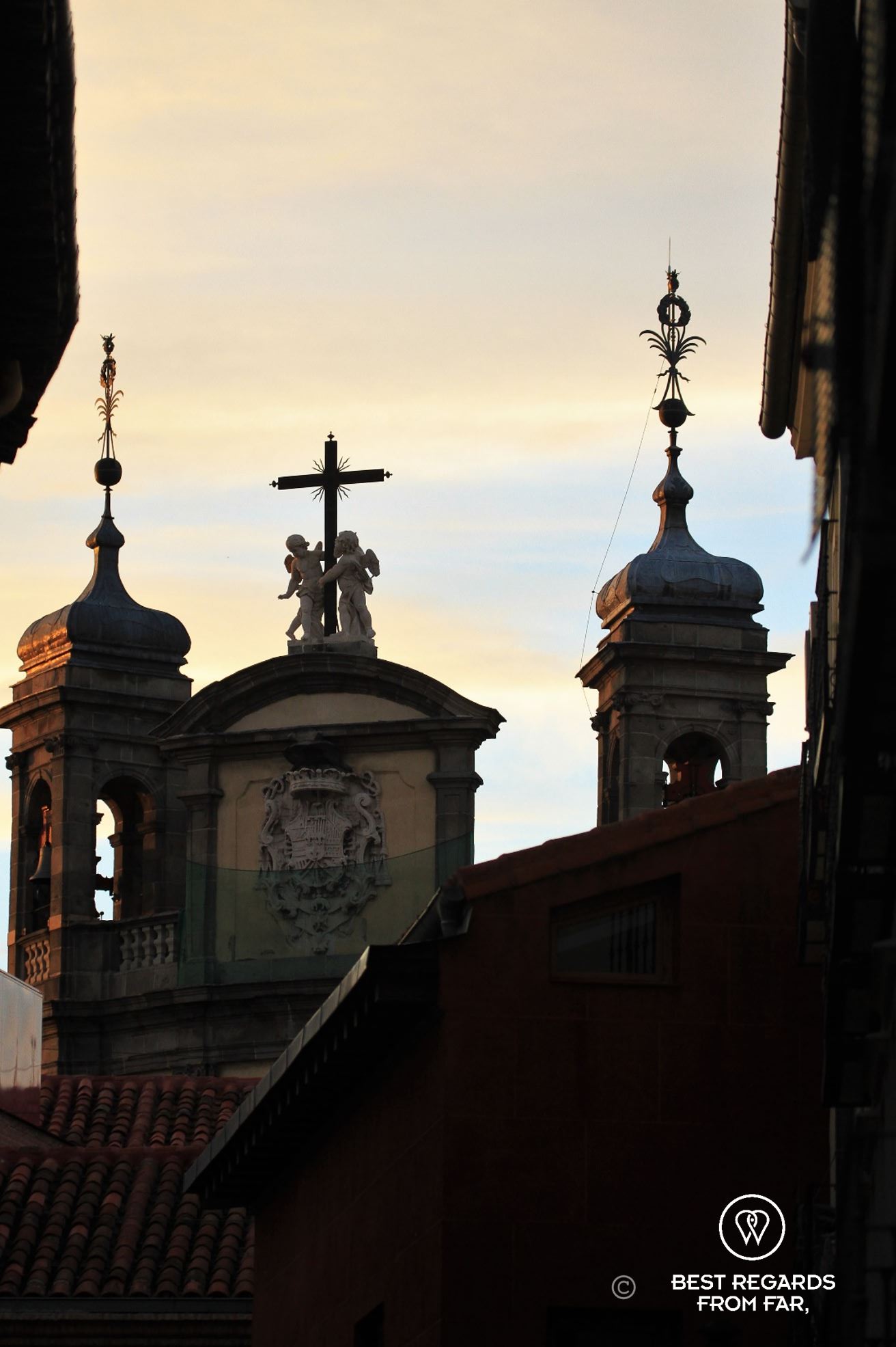 Close-up of church towers during the golden hour in Madrid.