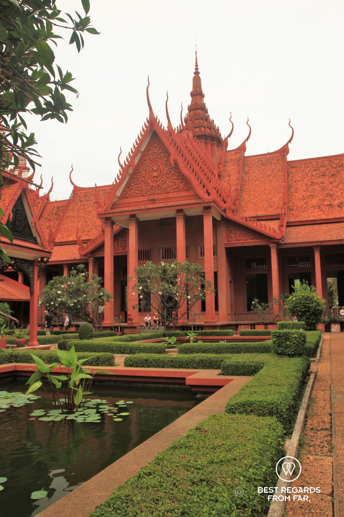 Garden and characteristic facade and roof of the National Museum of Phnom Penh.