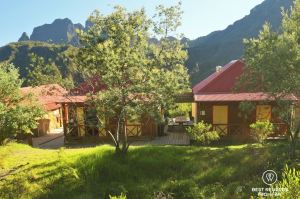 The colorful Marla Gîte in the middle of the green mountains, on the exclusive multiday hike through the 3 cirques, Réunion Island.