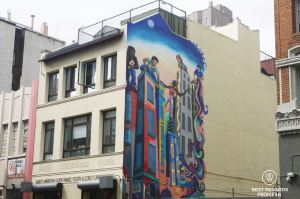 Colorful mural on the side of a building.