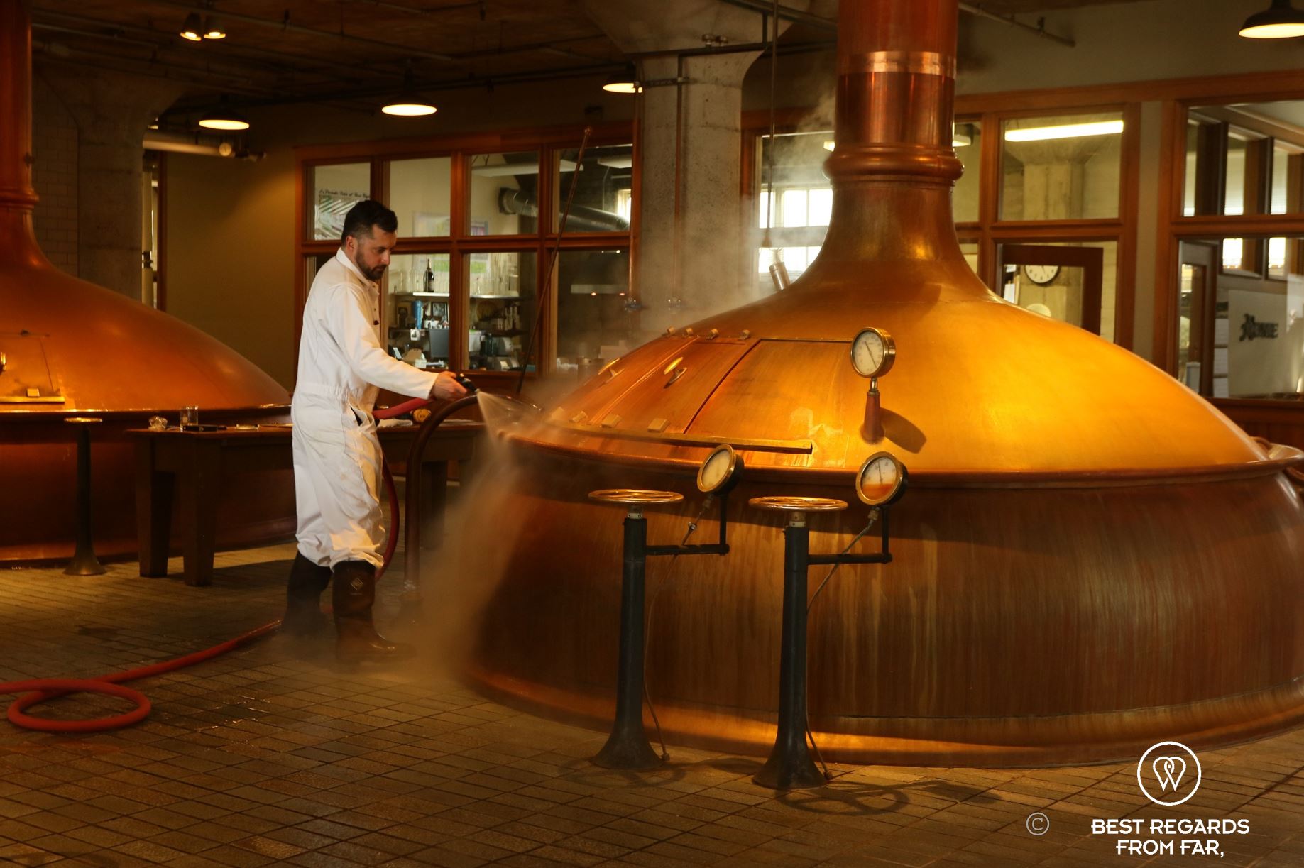 Brewer at work in a brewery.