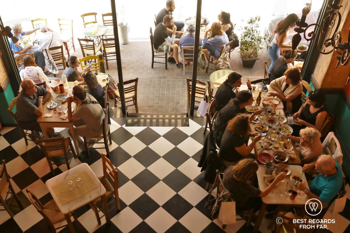 People having lunch in a local restaurant in Psiri, Athens, Greece