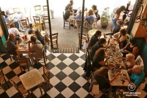 People having lunch in a local restaurant in Psiri, Athens, Greece