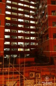 Typical flats in Kowloon at night showing a high density of population in Hong Kong