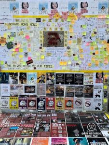 Wall in Hong Kong covered in posters for free Hong Kong during the protests