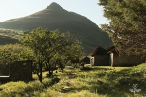 Traditional rondavels lined up in the village of Makhapung in Eastern Lesotho in the early morning light
