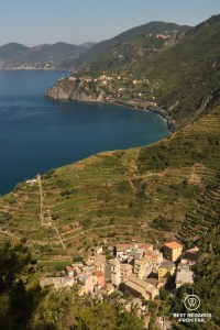Stunning view on the sea, the amphitheater of terraced vineyards and the city of Manerola in Cinque Terre, Italy