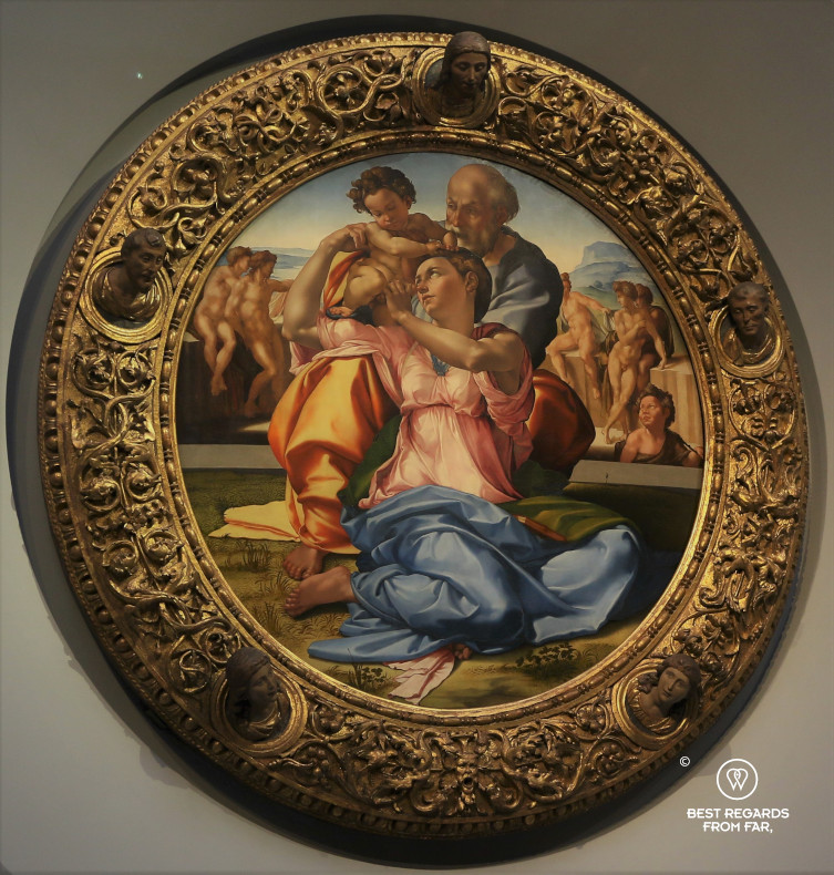 The Holy Family with the Young St. John the Baptist by Michelangelo in the Uffizi museum in Florence, Italy
