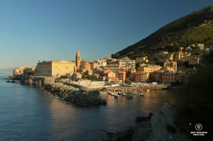 Charming Nervi with its harbour and pastel coloured houses and church, Italian Riviera.