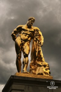 The golden sculpture of Hercule in the garden of the castle of Vaux le Vicomte, France.