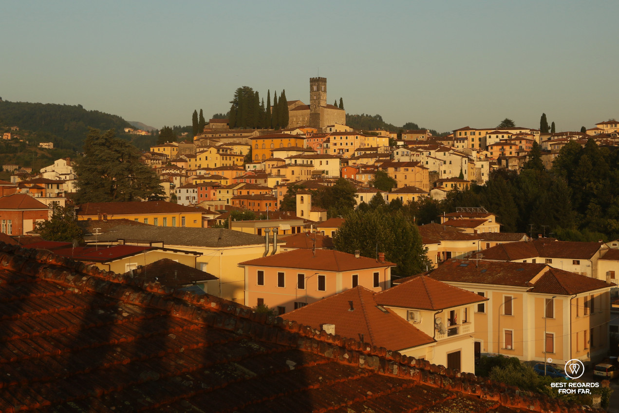 Barga dominated by its Duomo at sunset, Italy.