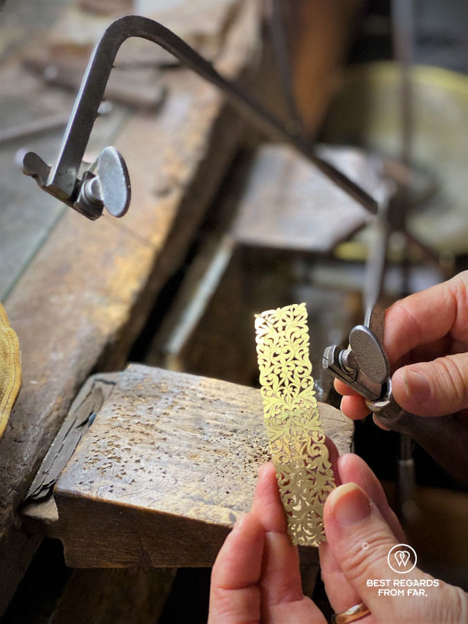 The crafts of Florence: goldsmith making a pice of jewellery.