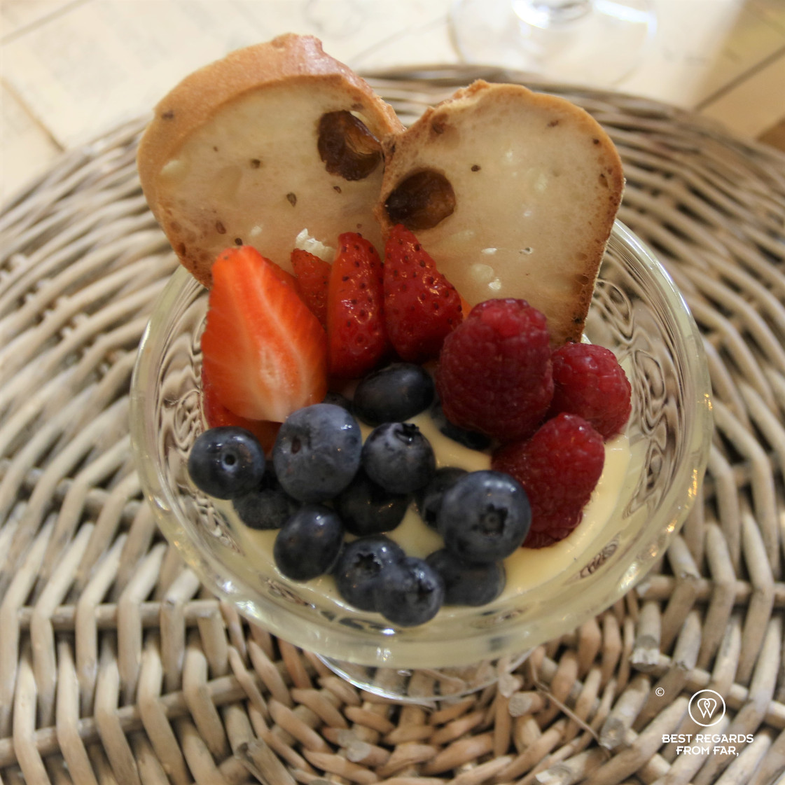 Vanilla custard with buccellato and red berries