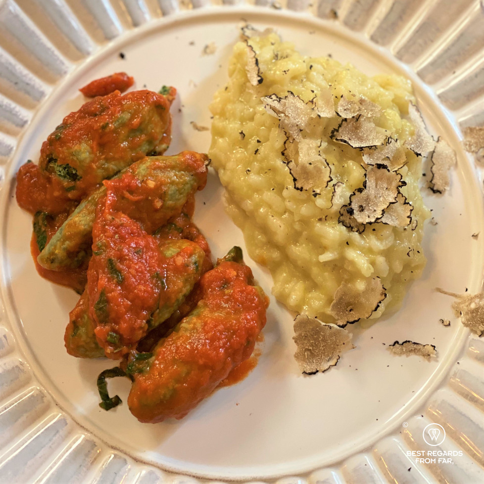 Spinach and ricotta noodles in tomato sauce with truffle risotto. Extra Virgin Cooking Class, Lucca, Italy