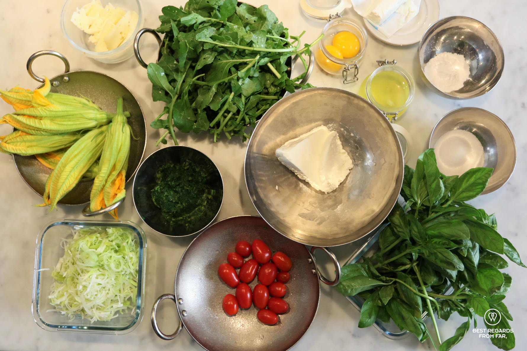 White marble kitche counter with fresh ingredients from Italy
