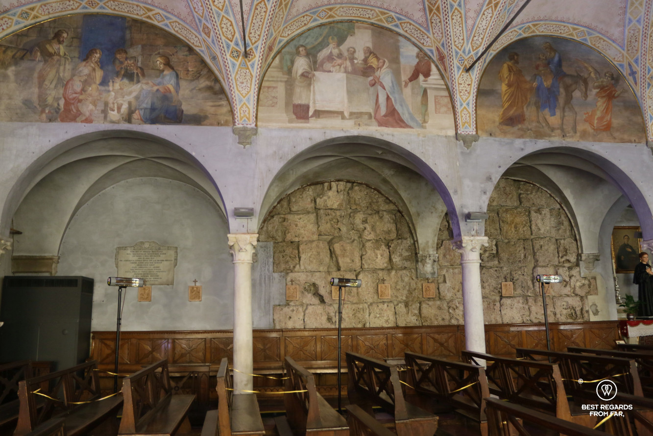 The roman wall in the Santa Maria della Rosa Church, Lucca, Italy