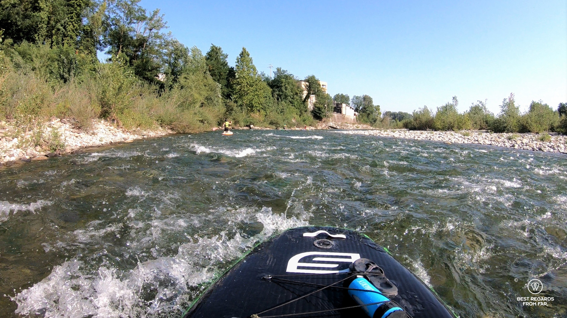 Stand Up Paddling the white waters of the Serchio River by Lucca, Italy.