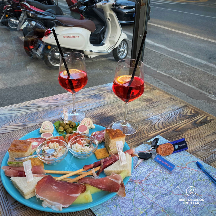 Preparing a scooter loop around an aperitivo in Siena, Italy