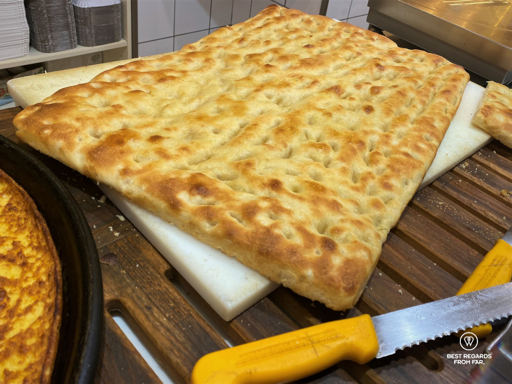 Large focaccia in a bakery in Italy