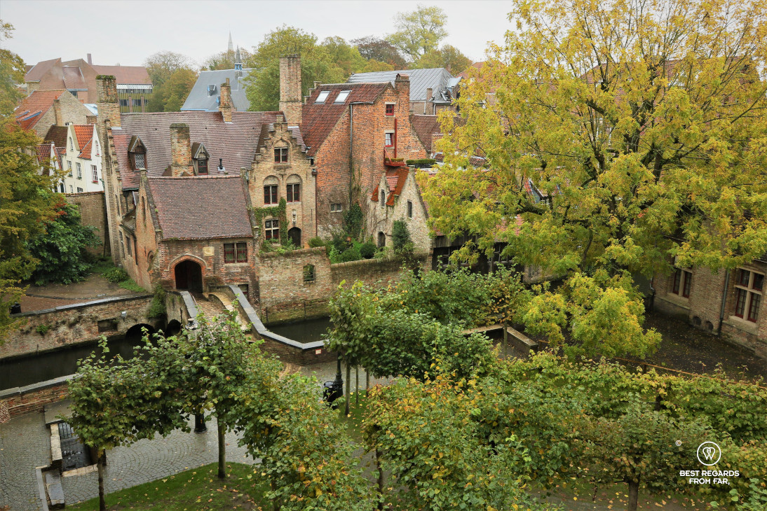 Small stone brige over a small canal in the medieval looking Bruges