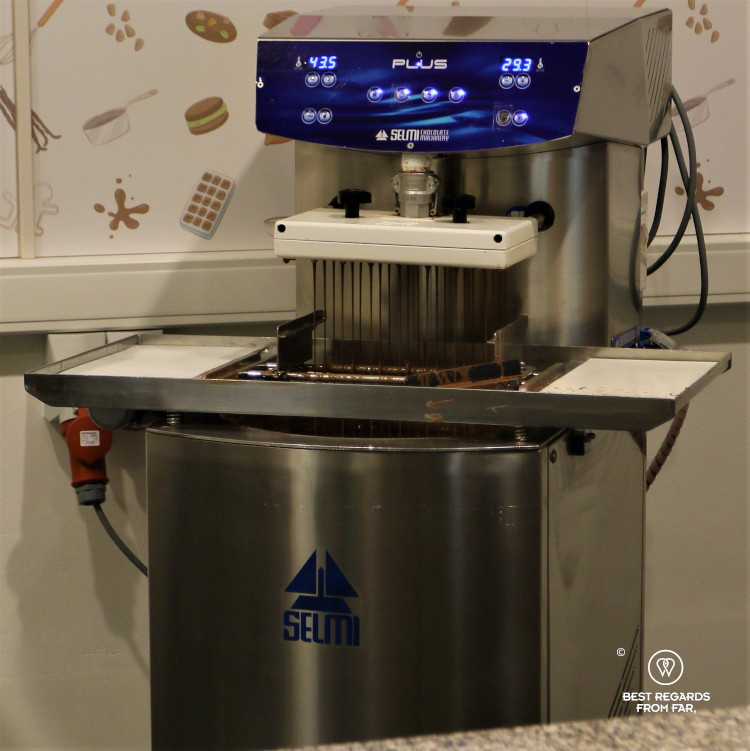 A chocolate machine making chocolates in Belgium