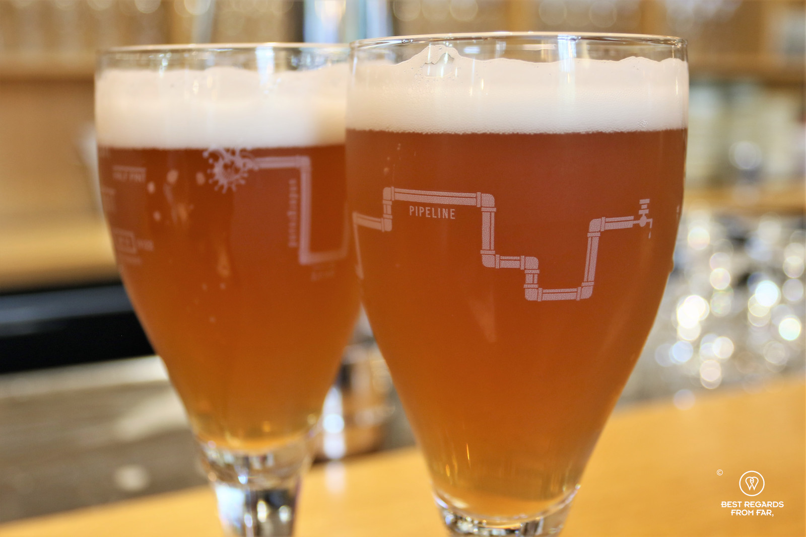 Two glasses of beer with the beer pipeline drawn at the glass