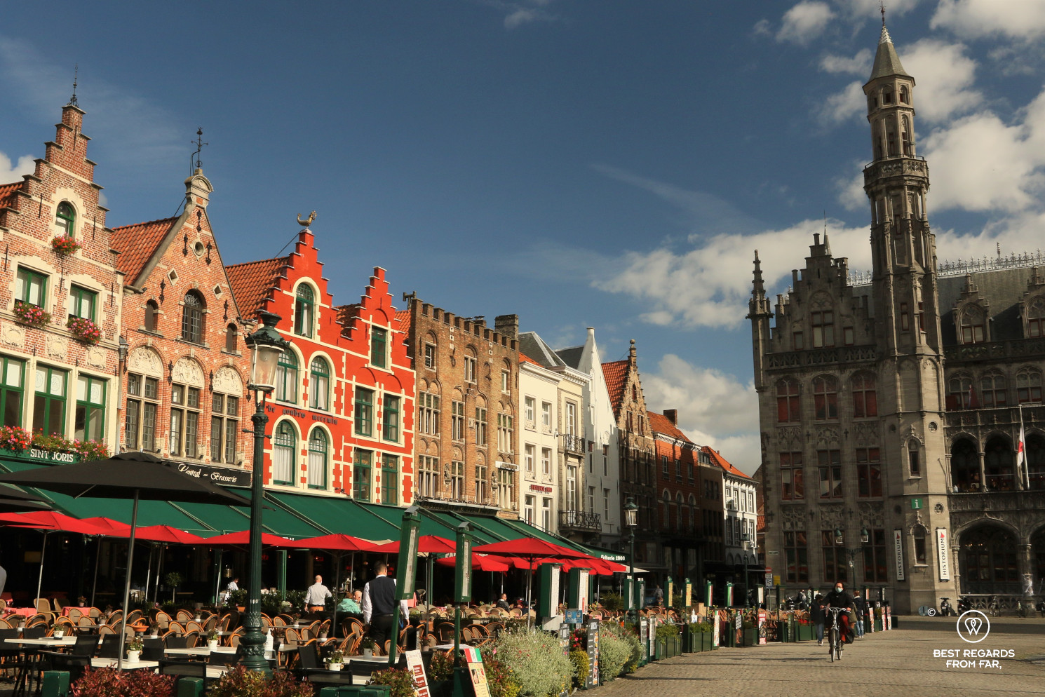 The Market Square of Bruges, Belgium, with its typical medieval architecture.