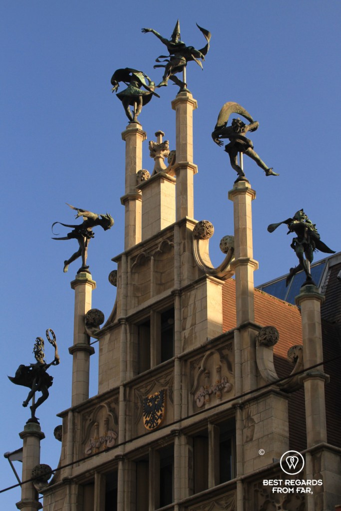 Façade of the restored mason's house in Ghent with its dancers on top, Belgium