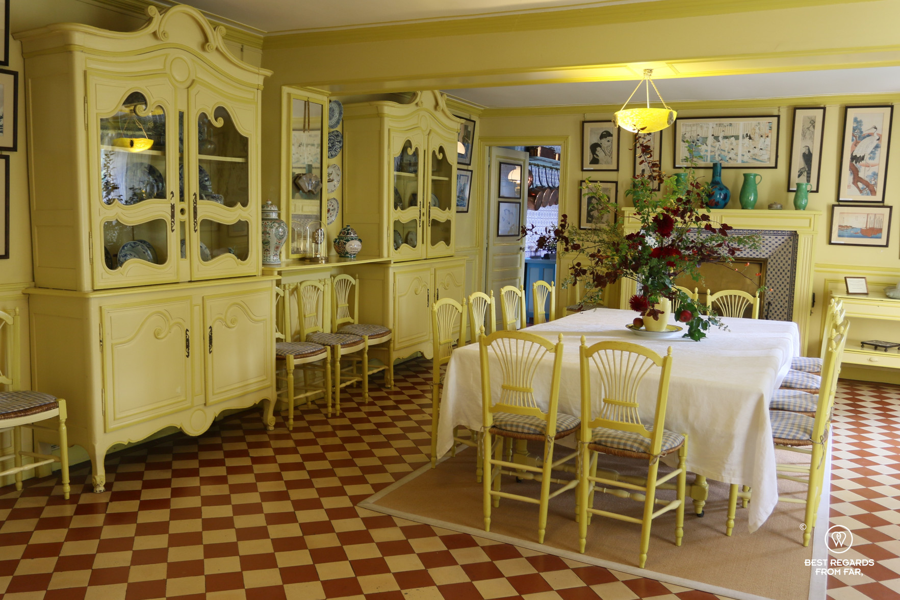 The modern yellow dining room in Claude Monet's house in Giverny, France