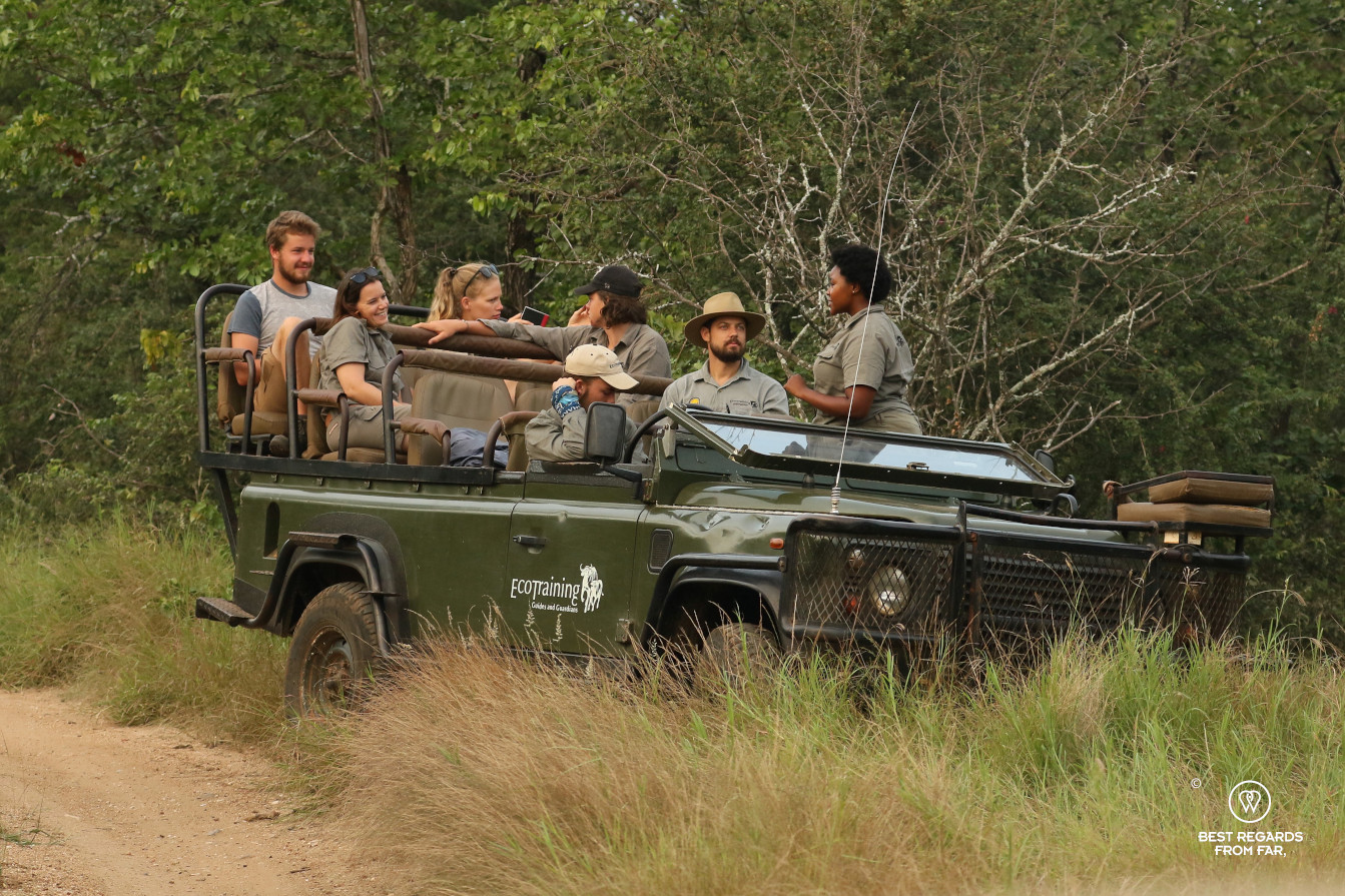 Students on a field guide training in an EcoTraining Land Rover in the African bush