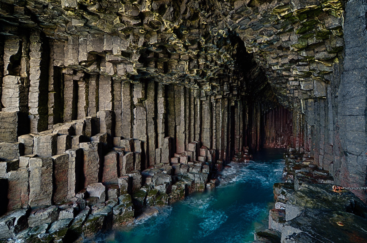 Fingal’s Cave seen from the inside with its basalt columns.