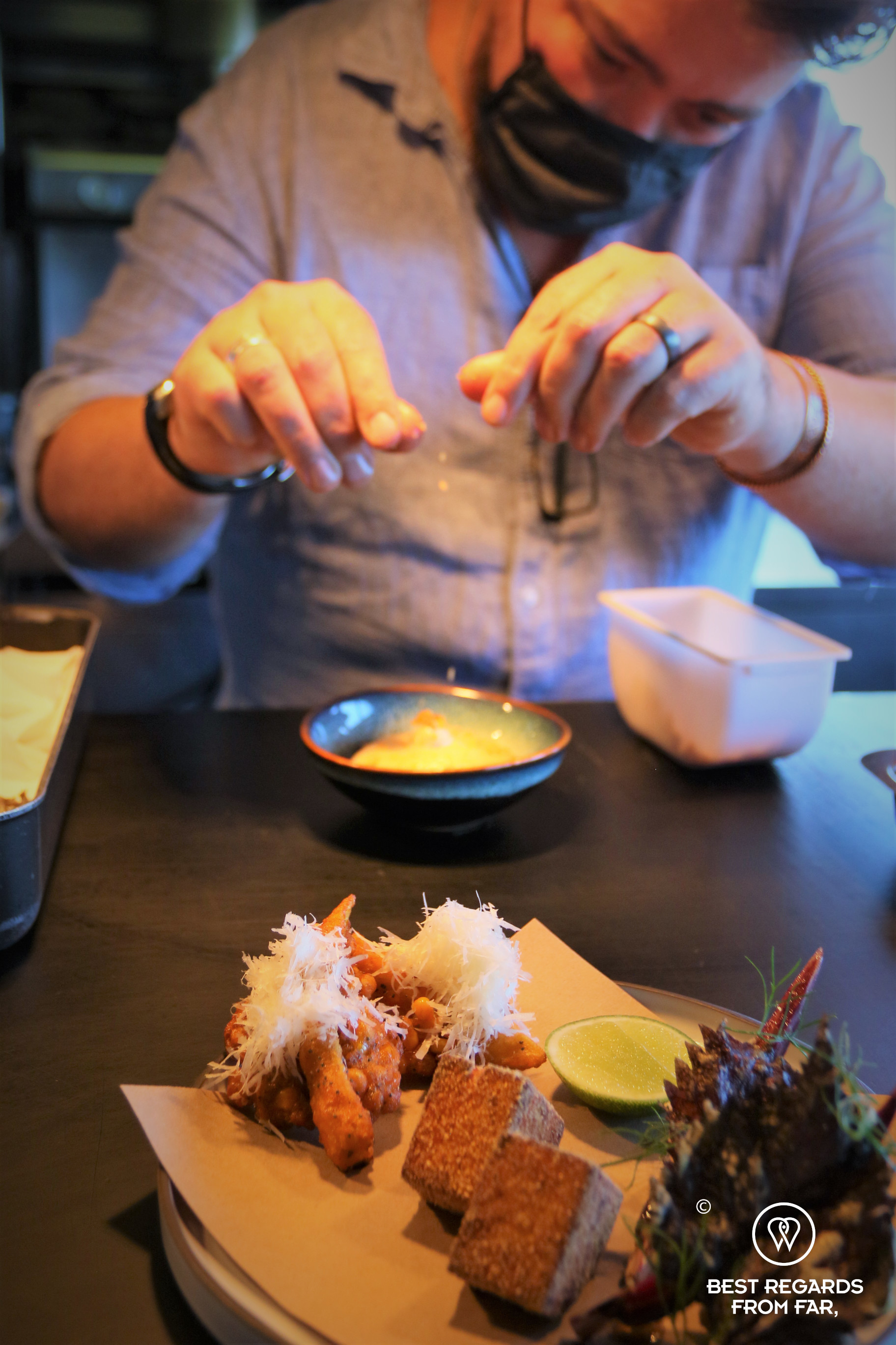 Head chef Chef Ivor Jones plating a fritto misto at the Chefs Warehouse Beau Constantia